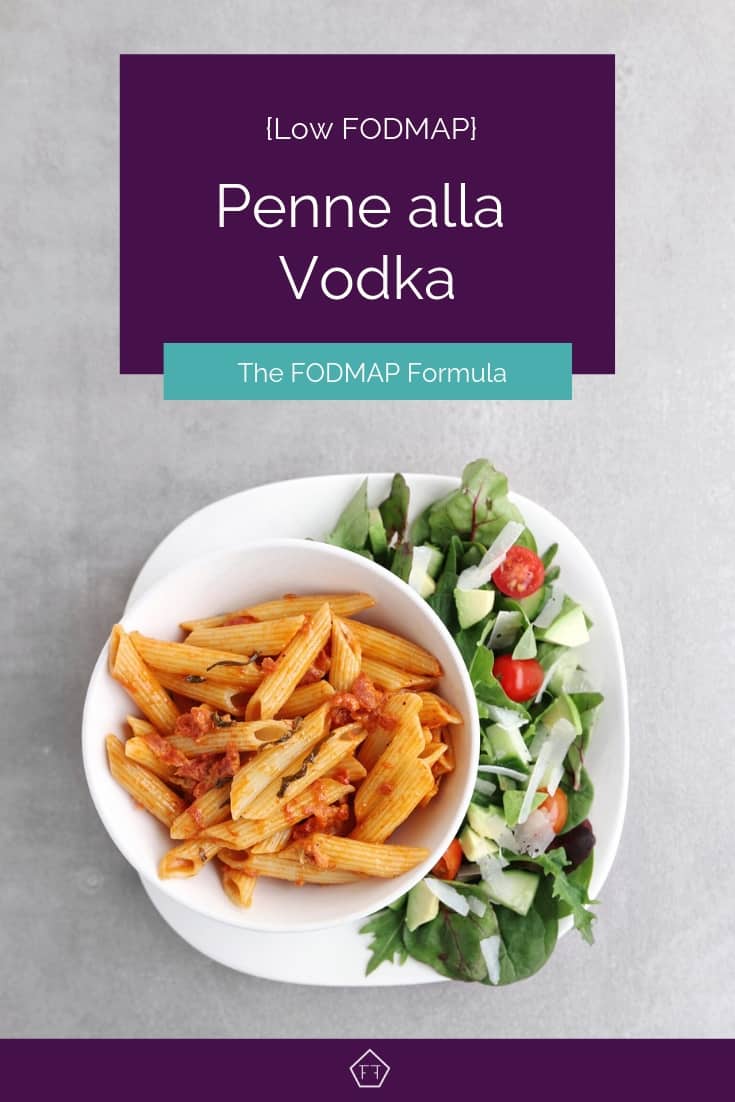 Low FODMAP penne alla vodka on plate with side salad - Pinterest 1